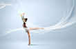 Young woman in gymnast suit posing