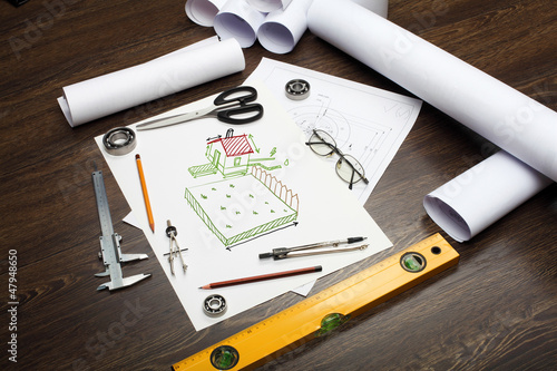 Photo: Tools and papers on the table Tools and papers on the table