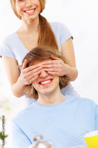 Photo: Young couple at home together Young couple at home together