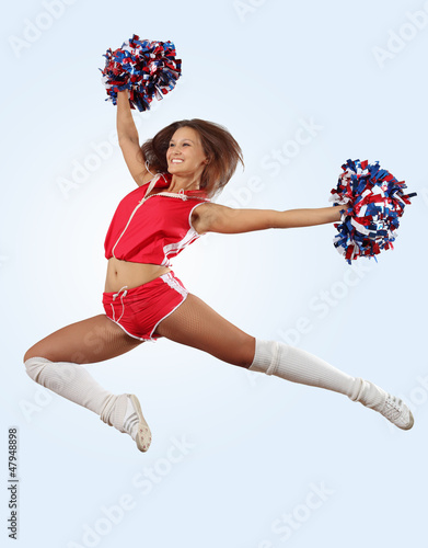 Photo: cheerleader girl jumping cheerleader girl jumping