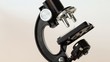 black brilliant small microscope rotates alone