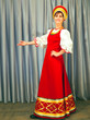 Russian girl in national costume in full growth