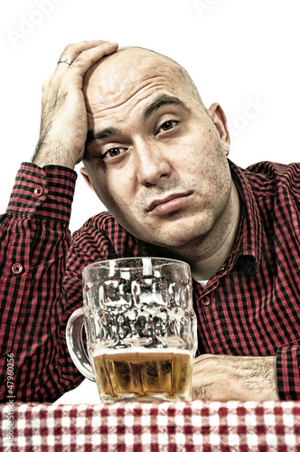 Photo: Sad beer drinker Sad beer drinker