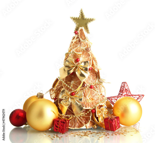 Photo: beautiful christmas tree of dry lemons with decor, isolated beautiful christmas tree of dry lemons with decor, isolated