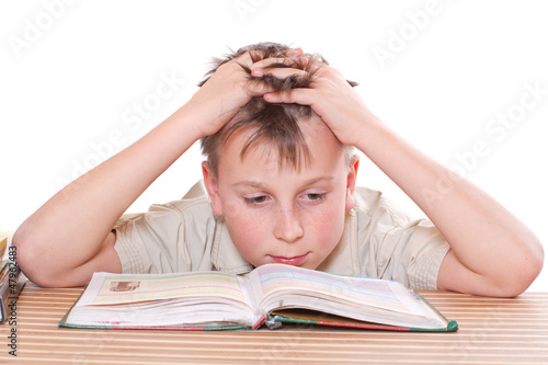 Photo: boy learns lessons boy learns lessons