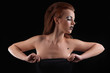 Fashion girl posing on dark background - portrait
