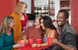 Smiling Man with Group of Friends
