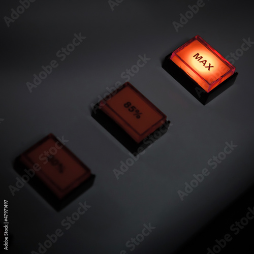 Photo: Illuminated max button on industrial power control panel Illuminated max button on industrial power control panel