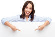 Woman pointing at blank poster