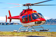 Photo: Startender Hubschrauber Bell 407 von malerischem Landeplatz Startender Hubschrauber Bell 407 von malerischem Landeplatz