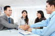 business team making a deal