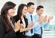 clapping office workers