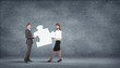 Piece of puzzle and business persons
