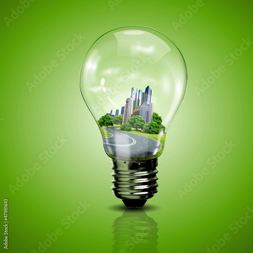 Photo: Electric light bulb and planet inside it Electric light bulb and planet inside it