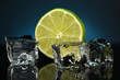 Ice cubes with lime on darck blue background