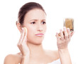 woman applying makeup