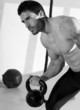 Crossfit man lifting kettlebell workout exercise