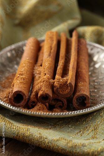 Photo: Cinnamon sticks and powder cinnamon Cinnamon sticks and powder cinnamon