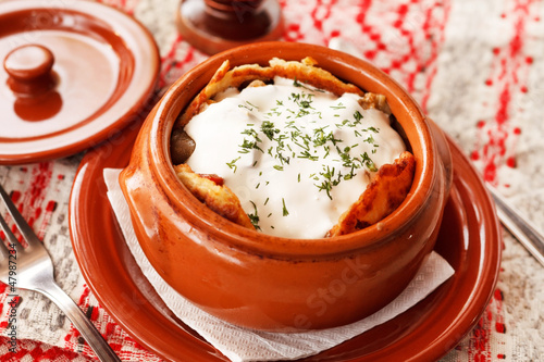 Photo: potato pancakes in the pot (national belorussian food) potato pancakes in the pot (national belorussian food)