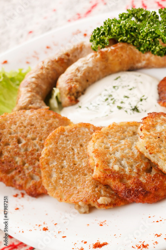Photo: potato pancakes with sausage potato pancakes with sausage