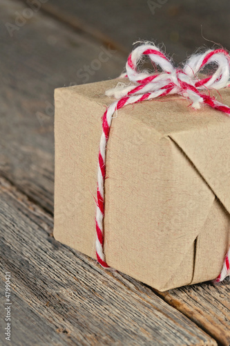 Photo: Brown paper package tied up with strings Brown paper package tied up with strings