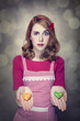 Redhead women with cookies