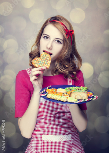 Photo: Redhead women with cookies Redhead women with cookies