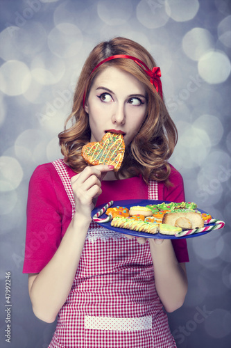Photo: Redhead women with cookies Redhead women with cookies