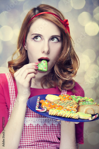 Photo: Redhead women with cookies Redhead women with cookies