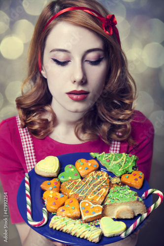 Photo: Redhead women with cookies Redhead women with cookies