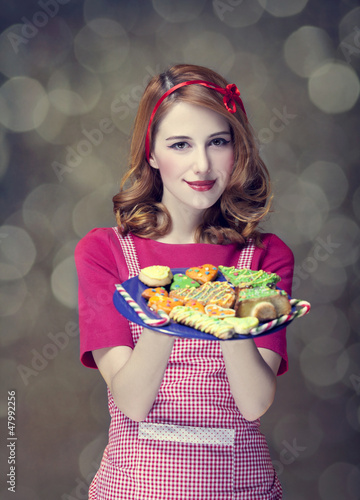 Photo: Redhead women with cookies Redhead women with cookies