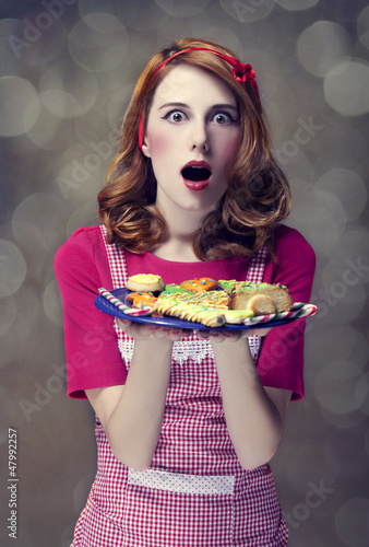 Photo: Redhead women with cookies Redhead women with cookies