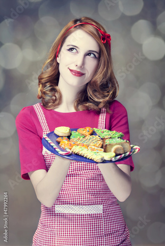 Photo: Redhead women with cookies Redhead women with cookies
