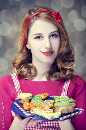 Photo: Redhead women with cookies Redhead women with cookies