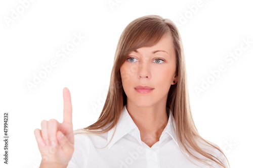 Photo: Woman pressing an abstract button. Isolated on white background Woman pressing an abstract button. Isolated on white background