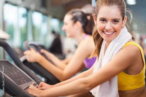 Photo: Woman training in a fitness club Woman training in a fitness club