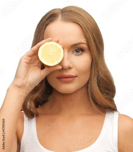 Photo: woman with lemon slice woman with lemon slice