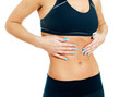 Woman suffering from stomach ache. Isolated on white.