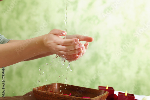 Photo: Female hands and manicure related objects Female hands and manicure related objects