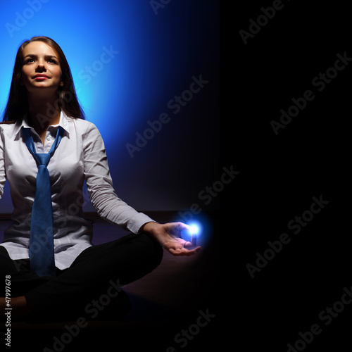 Photo: Business woman meditating Business woman meditating
