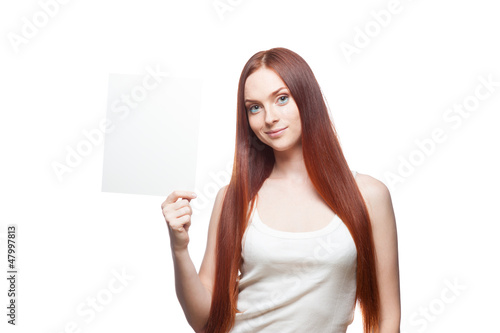 Photo: beautiful red haired girl holding sign beautiful red haired girl holding sign