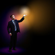Businessman with light shining