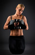 Fit woman holding weights