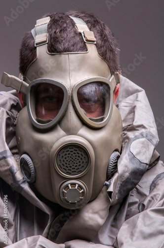 Photo: Man in protective suit Man in protective suit