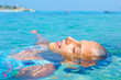 Foto: Young girl in the sea Young girl in the sea