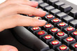 Painful typing on keyboard close-up