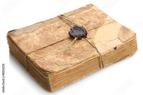 Photo: Old book with seal wax, isolated on white Old book with seal wax, isolated on white