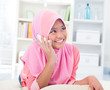 Southeast Asian teenager talking on phone