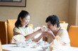 Asian Chinese family having meal