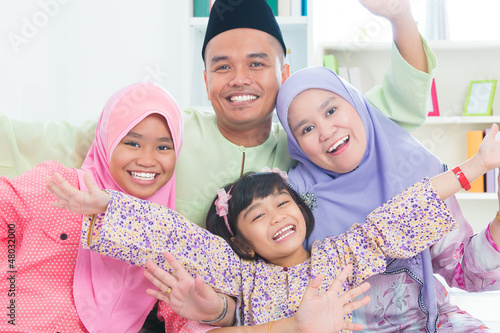 Photo: Southeast Asian family quality time at home. Southeast Asian family quality time at home.